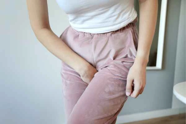 woman struggling with urine incontinence Bethnal Green