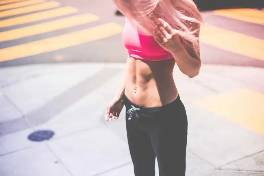 Woman with toned stomach after LA-EMS Body Sculpting Treatment Bethnal Green